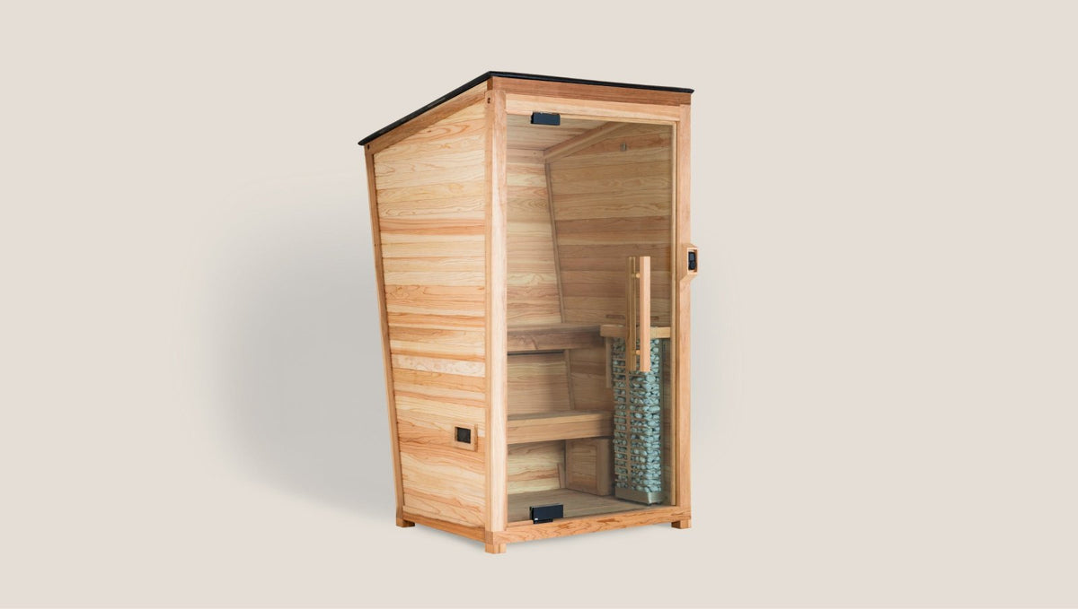 The Sauna Mini compact infrared sauna inside a home wellness room