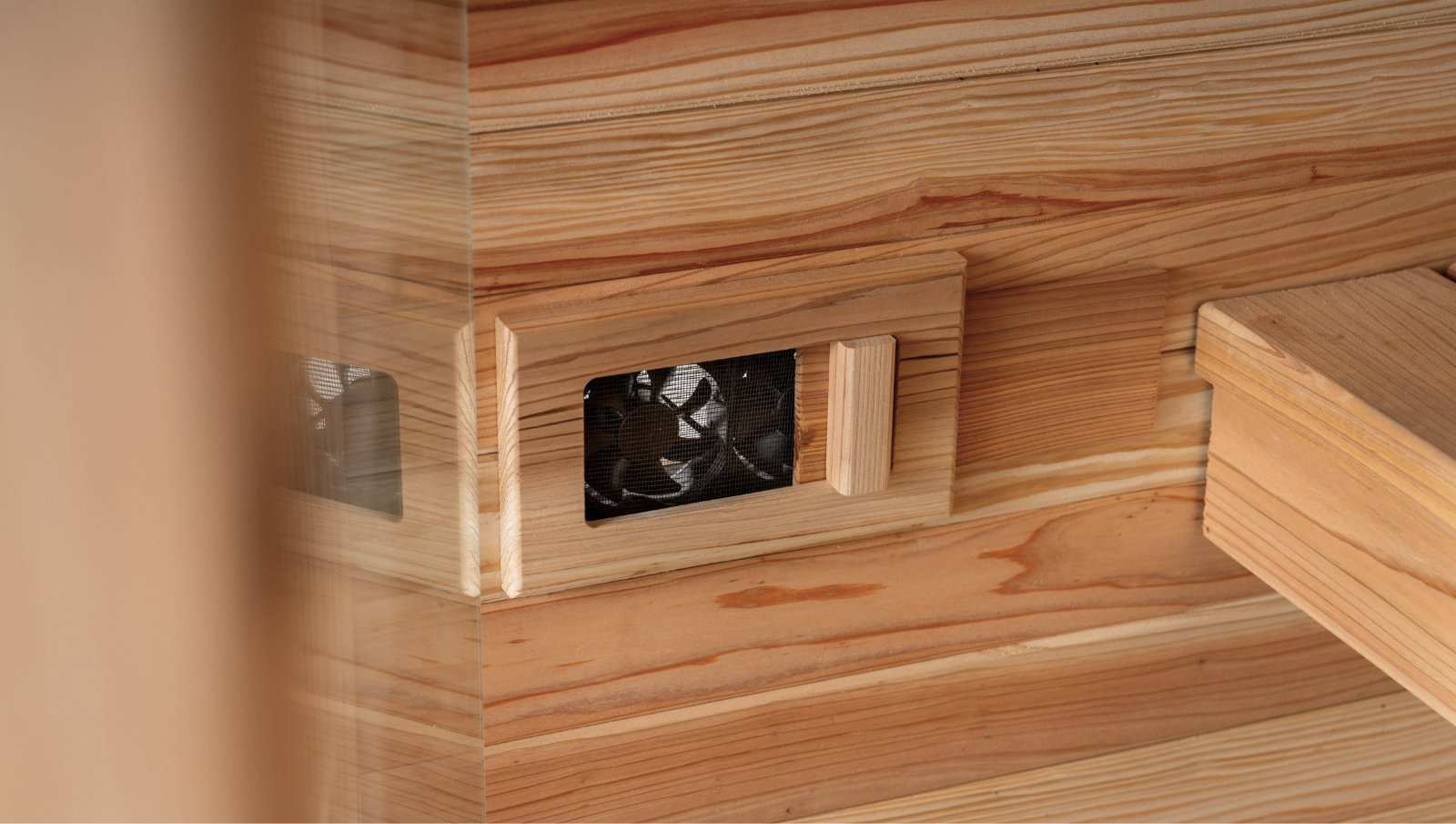 close-up of wooden infrared sauna mini unit vent in home wellness setup