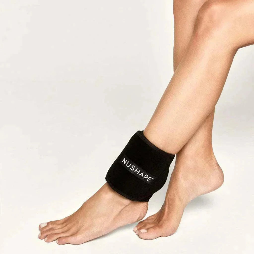 Nushape Mini portable red light LED wrap worn on ankle for pain relief and muscle recovery