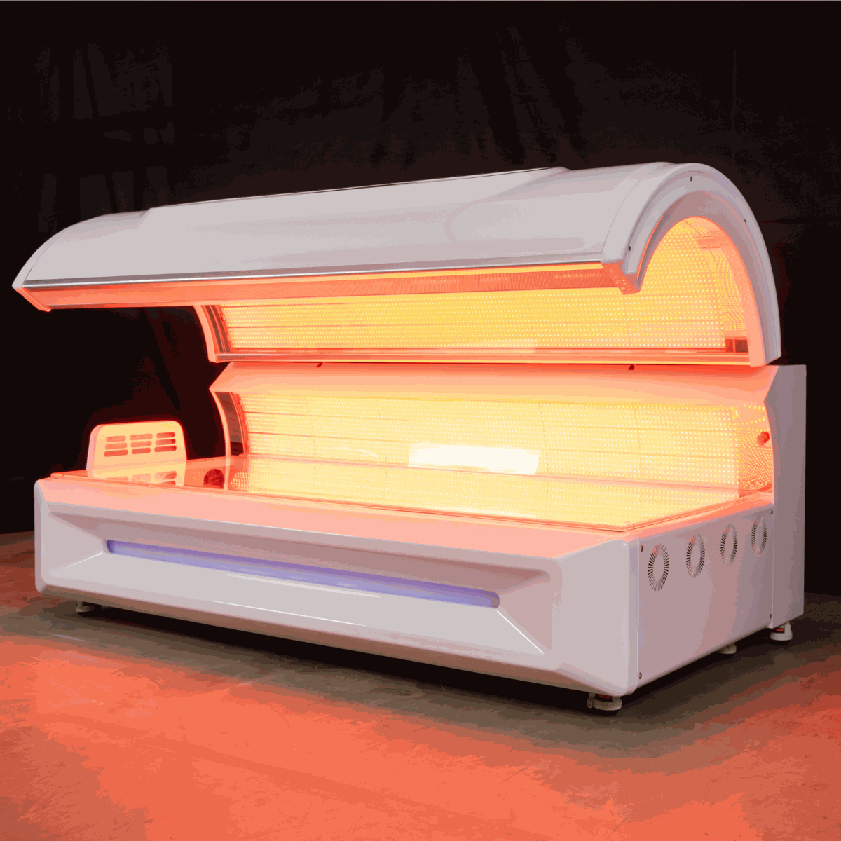 Commercial red light therapy bed with 360-degree LEDs and cooling fans for home and business use