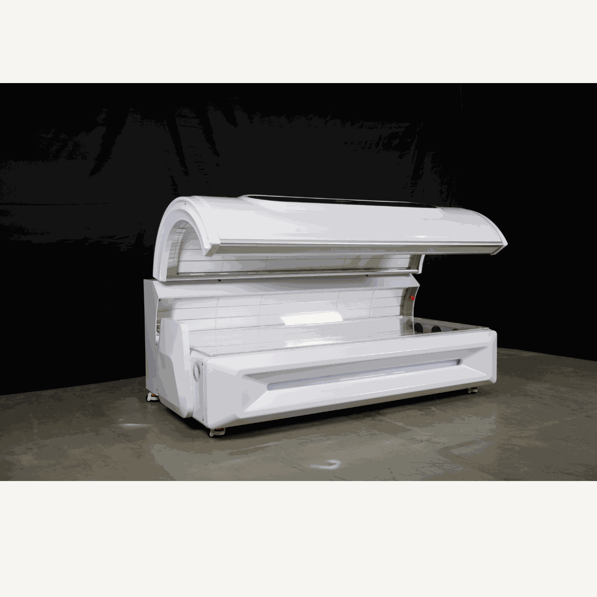 Modern white red light therapy bed with curved lid open, designed for home and commercial use