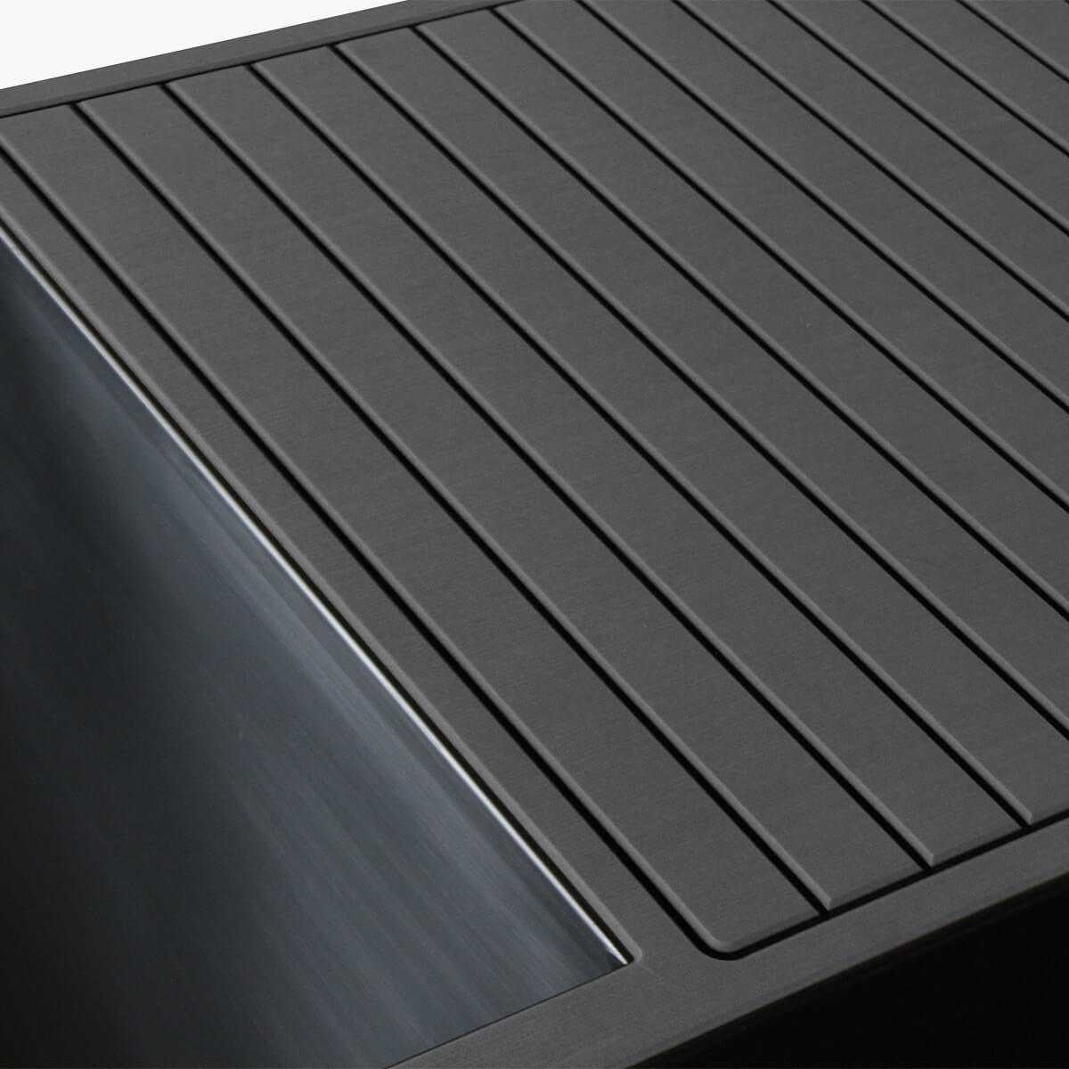 Close-up of Luxury Plunge sleek insulated cold plunge tub cover with grooved design in black