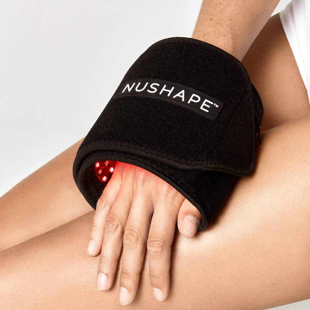 Nushape Mini portable red light LED therapy wrap on hand for pain relief and muscle recovery