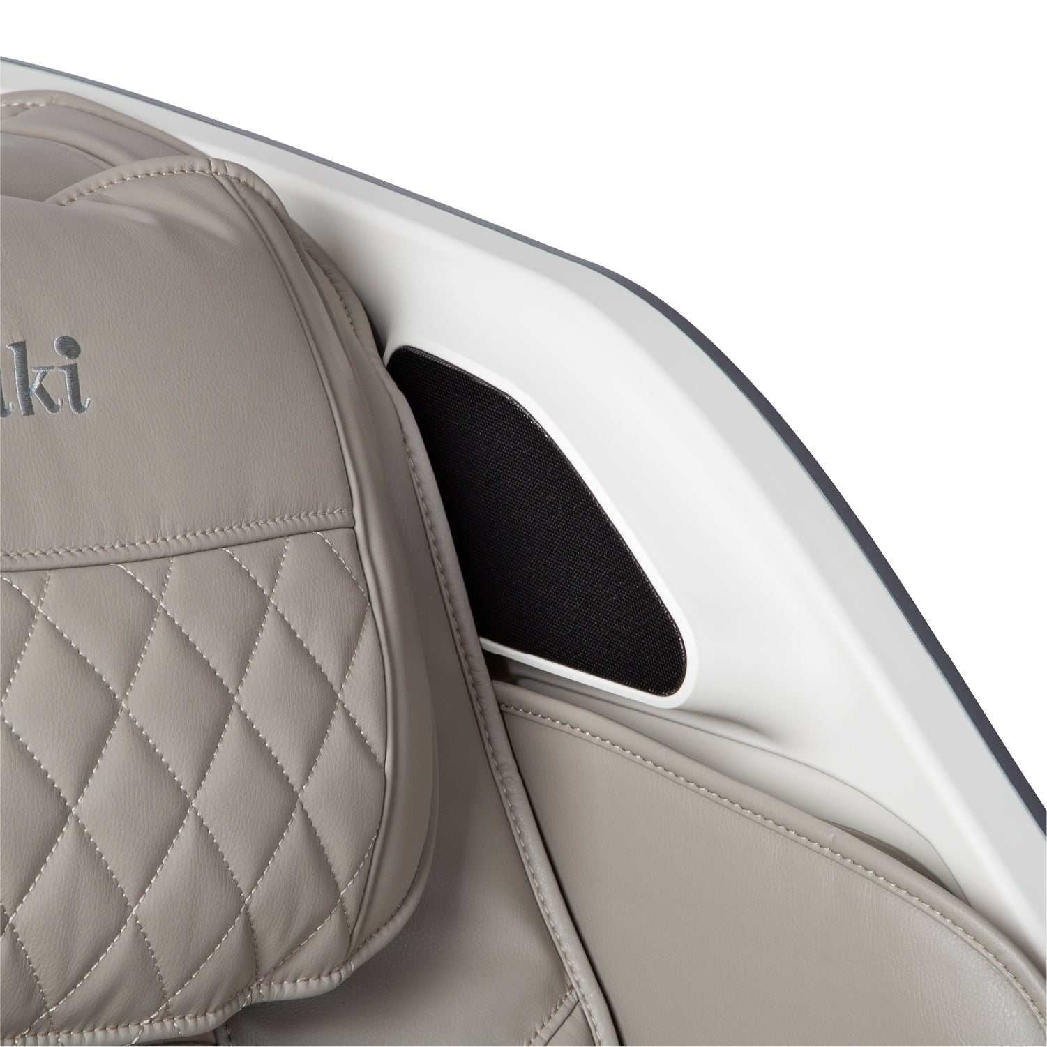 Close-up of JP-Nexus 4D massage chair featuring quilted lumbar cushion and white frame detail