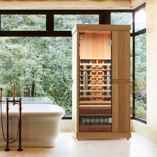 Finnmark FD-1 full-spectrum infrared sauna in modern bathroom setting with large windows