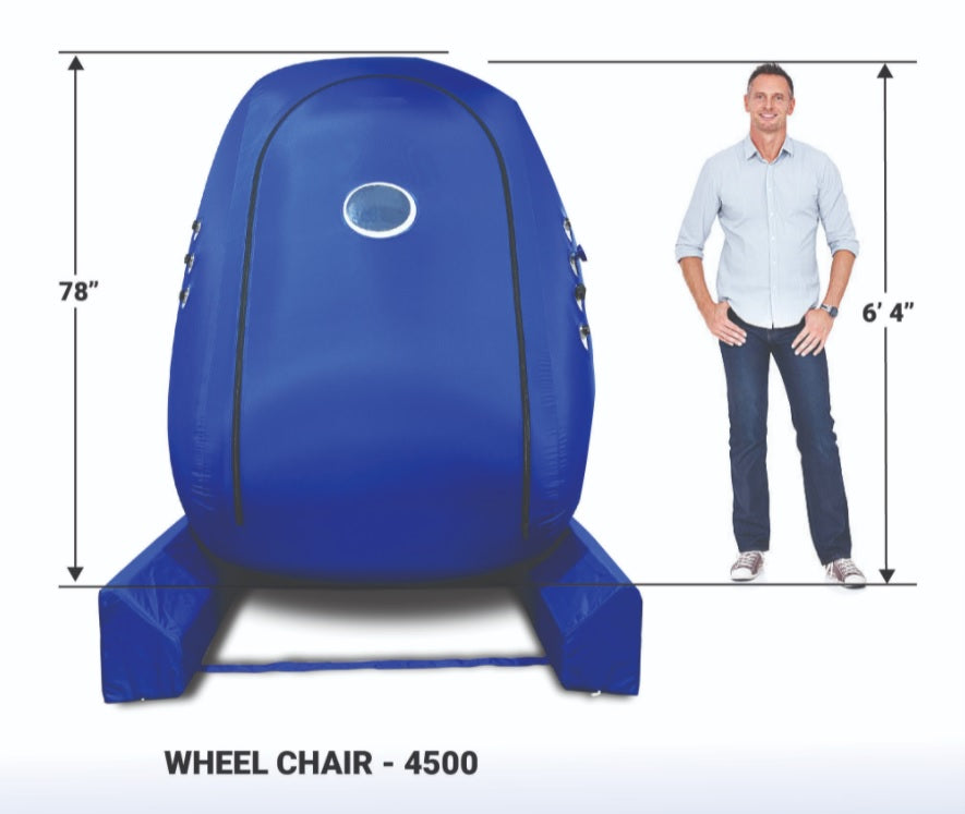 Person entering the wheelchair-ready vertical hyperbaric oxygen chamber through the 31-inch door
