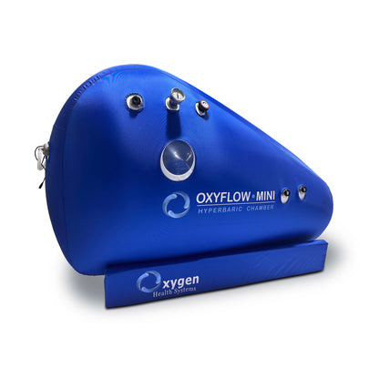 Soft shell sitting hyperbaric chamber inflated with metal external frame