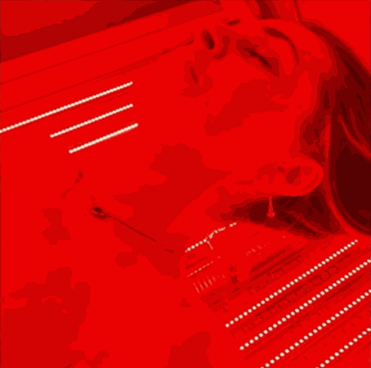 Woman using Airvida Aura Red Light Recovery system Bed emitting red LED light for skin and wellness sessions