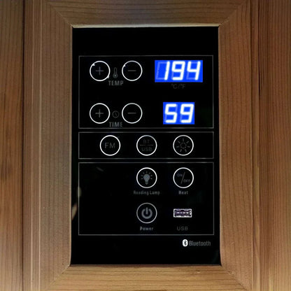Control panel of a traditional sauna with temperature, time, LED lighting, Bluetooth, and power buttons in wooden frame