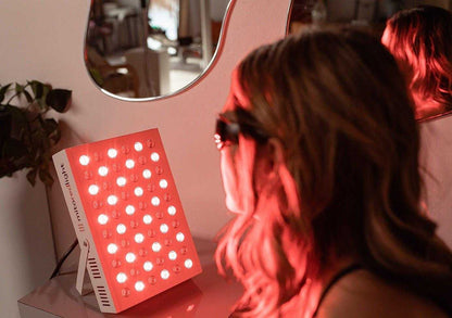 MitoMIN 2.0 red light therapy panel with 60 LEDs and adjustable timer in home use