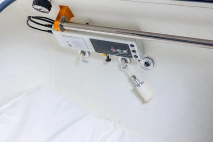 Hard-shell hyperbaric chamber detail view with onboard oxygen system